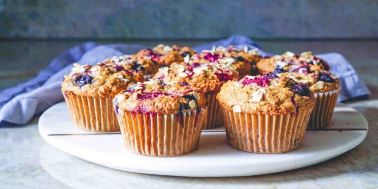 Vegan Gluten-free Oatmeal Banana Muffins with Mixed Berries. Healthy Dessert, Pastry. Selective Focus, toning.